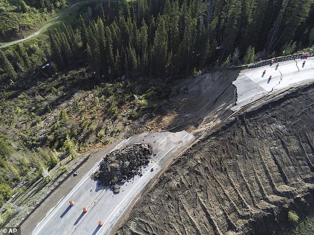 However, they were called away the next day due to a mudslide a few kilometers away.  This photo from Wyoming Highway Patrol shows a damaged section of Teton Pass on Saturday