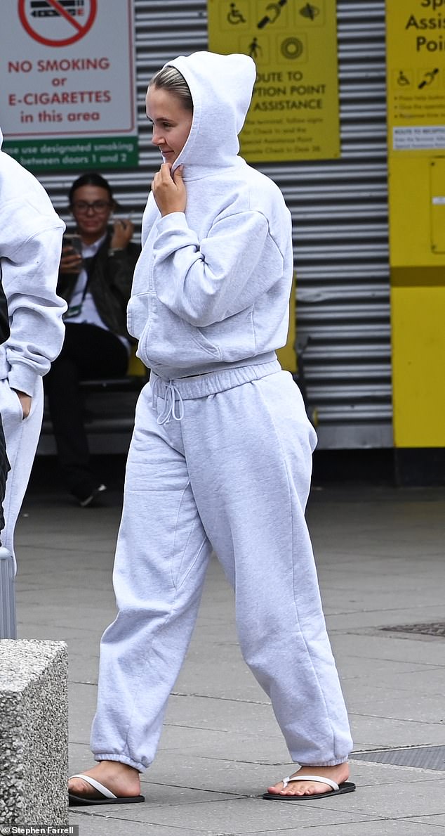 The mother-of-one looked casual in gray sweatpants as she was spotted in Britain after a quick business trip to Marrakesh, Morocco