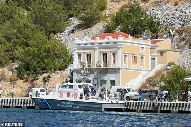 A Greek Coast Guard ship carrying the body is moored on the island of Symi