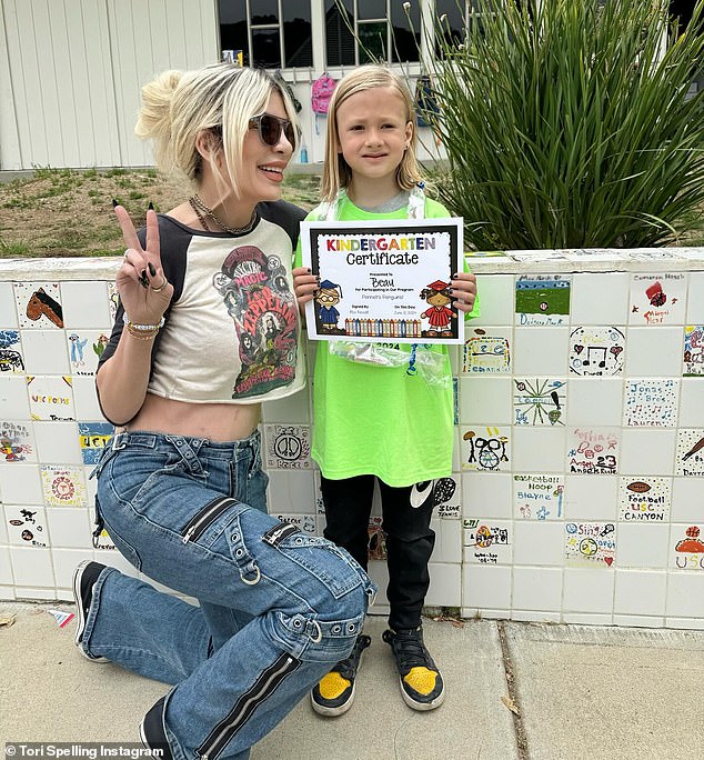 On Saturday, the 51-year-old actress shared photos of her seven-year-old son proudly holding up his graduation certificate as they posed outside his elementary school.