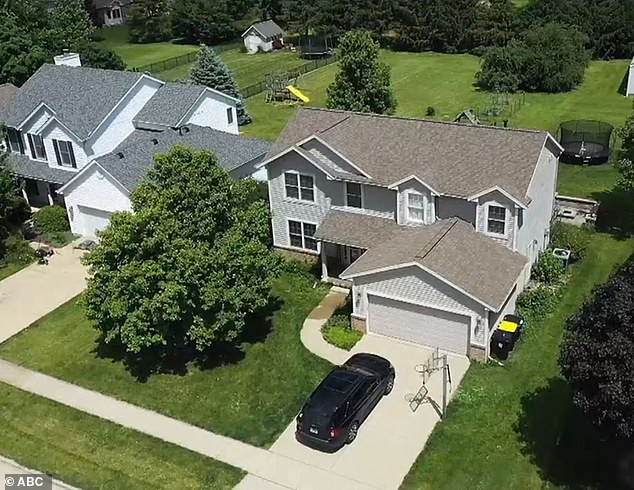 In the photo: the house where the apparent suicide took place.  It remains unclear whether the children - aged 12, 11 and 7 - were home at the time of the incident