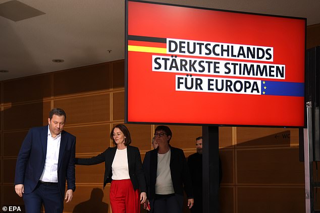 Vice-President of the European Parliament and top candidate for the European elections Katarina Barley (C), co-chair of the Social Democratic Party (SPD) Lars Klingbeil (L) and co-chair of the Social Democratic Party (SPD) Saskia Esken (R) arrive to make a statement during the European elections