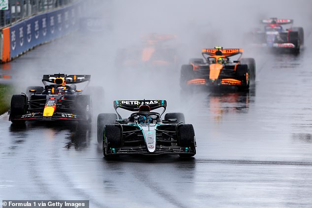 Verstappen (left) took first place after a battle in the rain on Sunday afternoon