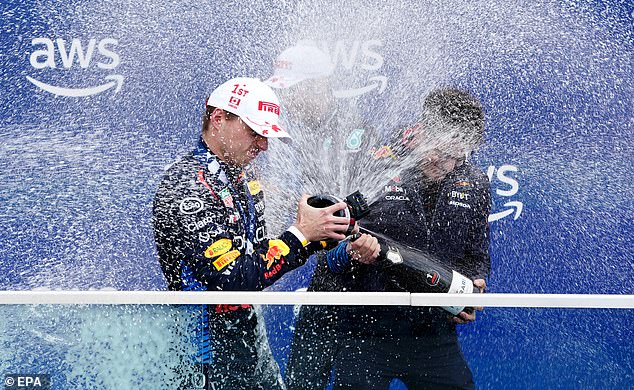 The Red Bull driver was pictured celebrating his breathtaking victory on the podium in Monreal