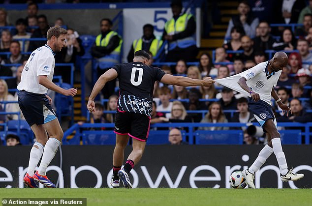 The undefeated boxer stumbled on the pitch after coming on as a substitute for Mauricio Pochettino's World XI