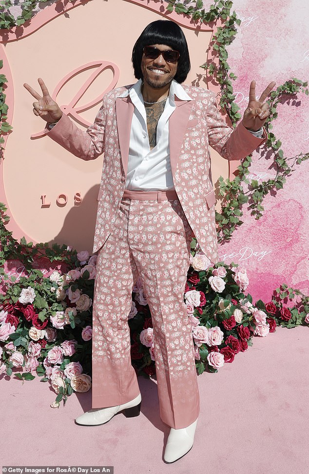 Music artist Anderson .Paak was also at the gathering and turned heads in a '70s-inspired pink suit