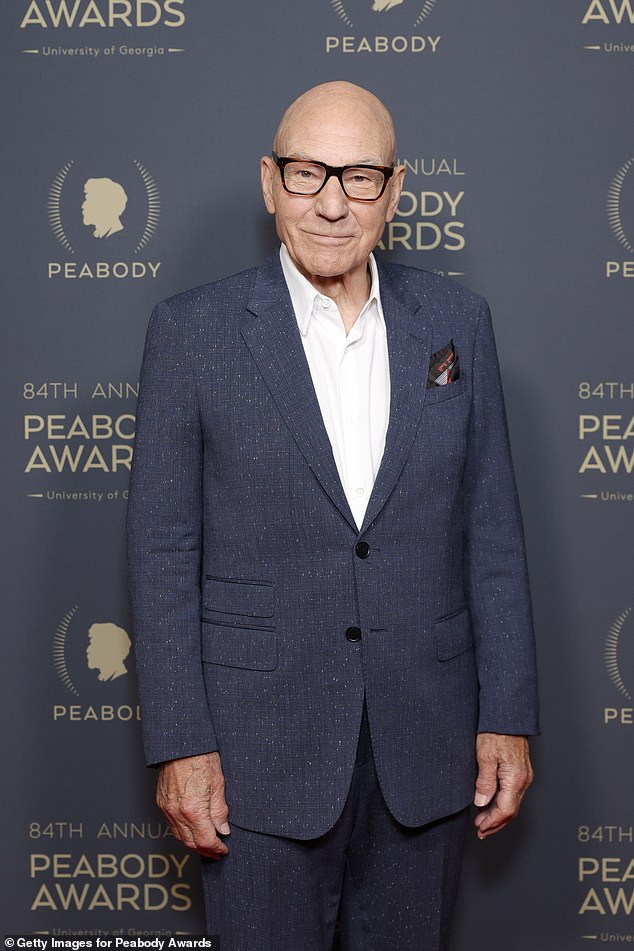 The beloved bald actor also wore thick black-rimmed glasses and a black pocket square for the evening festivities.