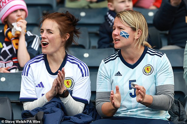 Two fans are fully cheering on Steve Clarke's team