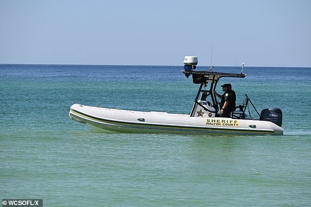 Sheriff's deputies are monitoring the waters near where Friday's shark attacks occurred