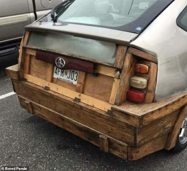 Good job!  A handy craftsman has rebuilt the back of a car, which probably should have been scrapped, from wood