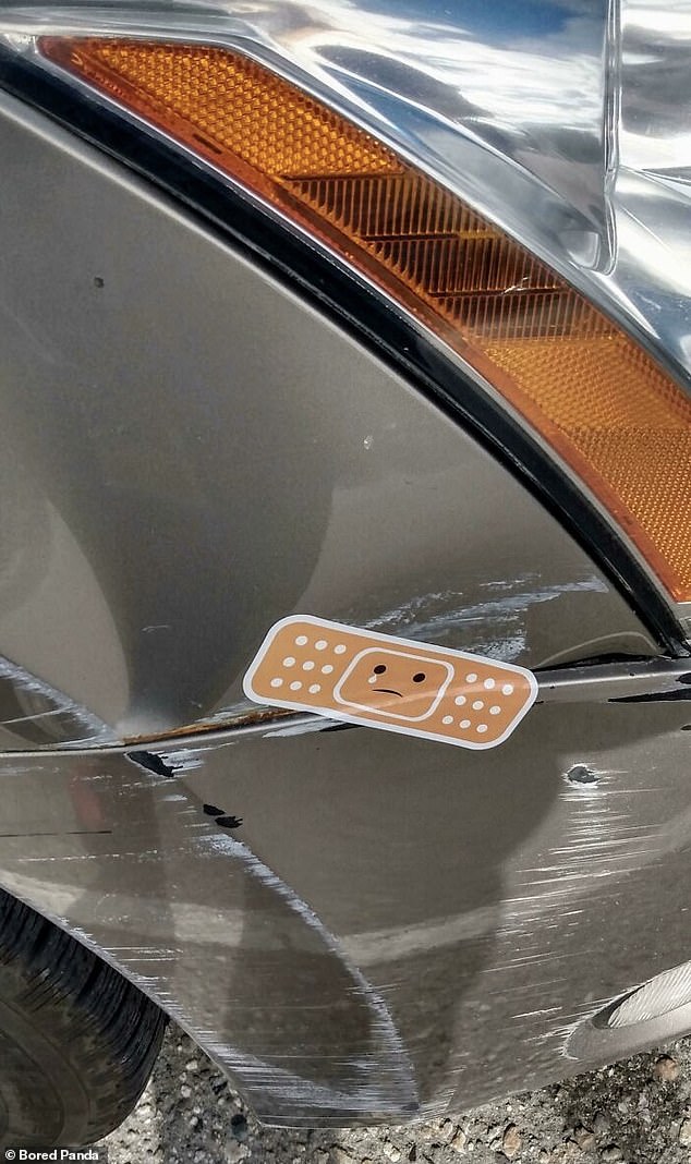 Oops!  Meanwhile, a woman put a plaster showing a sad face over a scratch she made on her husband's car