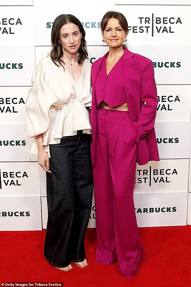 Gugino posed next to writer-director Laura Kosann, who donned an off-white puffy blouse and cardigan, dark blue jeans and sandals