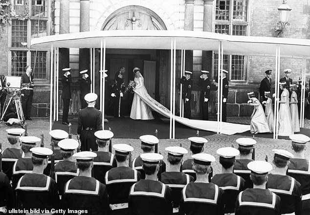 The princess wore an ivory silk dress by Danish couturier Jørgen Bender with a six-meter train