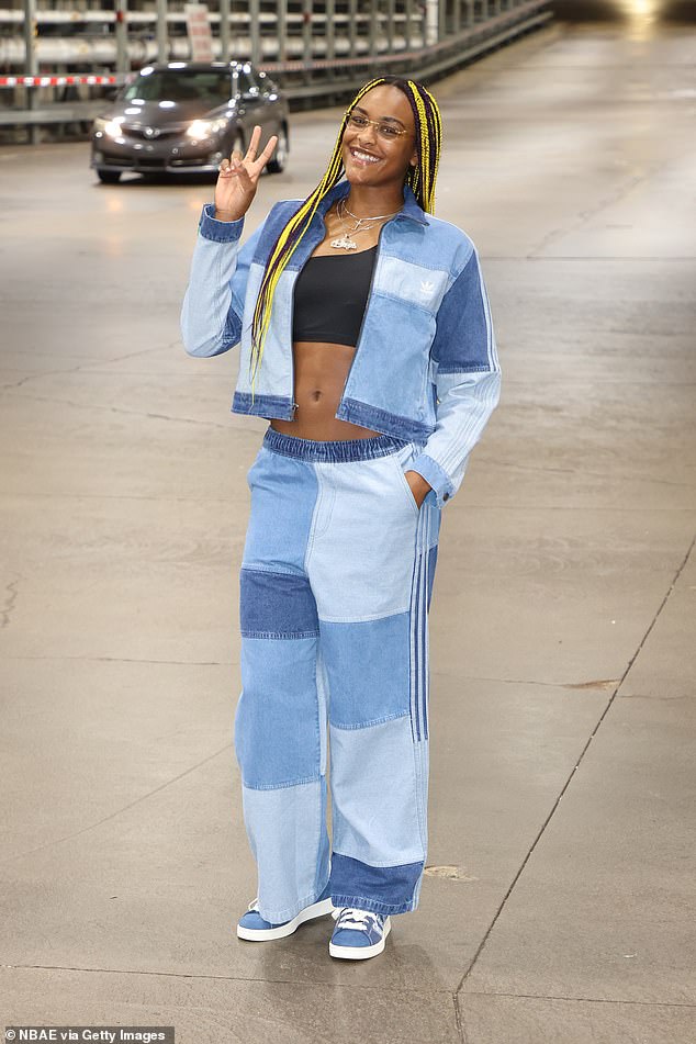 Aaliyah Edwards stuns in patchwork denim jacket with matching pants and sneakers