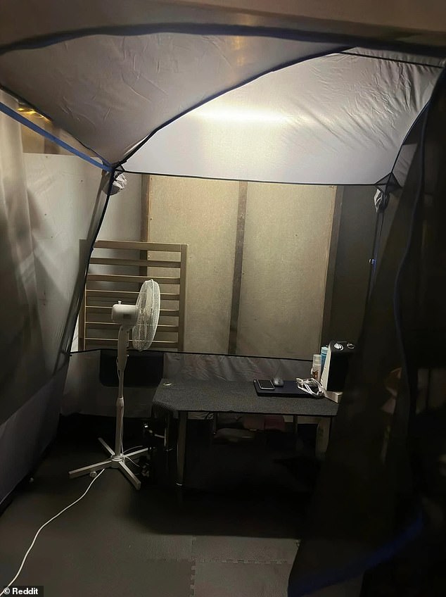 Photos of the home included in the advertisement for the studio home showed a small room in an outdoor garage containing various electrical appliances and a small desk (pictured)