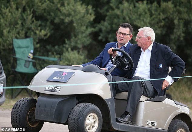 In a letter to the committee, more than 100 members, furious at not being able to take part in a round during lockdowns, claimed Andrews (pictured with Golf Australia chairman John Hopkins) 'does not have the qualities consistent with the fundamental values ​​of the club.  '