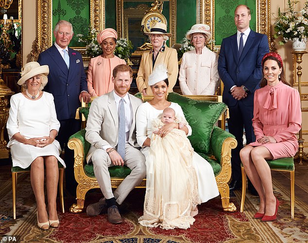 The Duke and Duchess of Sussex with their son Archie, and (from left to right) the Queen Consort, the King, Mrs Doria Ragland, Lady Jane Fellowes, Lady Sarah McCorquodale and the Prince and Princess of Wales at Windsor Castle after his baptism in July 2019