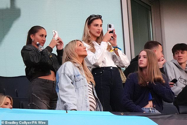 Zara was the epitome of chic as she happily supported Sam alongside his family in the stands