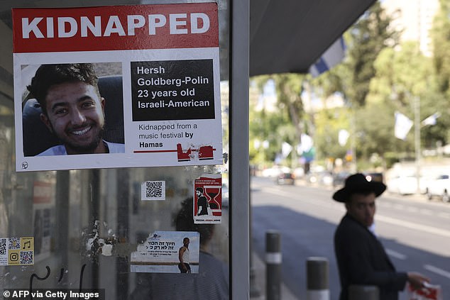 A poster of American-Israeli hostage Hersh Goldberg-Polin, who was held in the Gaza Strip by the Hamas militant after the October 7 deadly shooting, is placed at a bus station near the American consulate in Jerusalem on June 10, 2024.