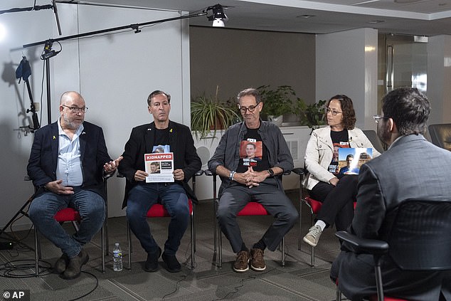 Families of Americans held hostage by Hamas in Gaza, from left to right: Jonathan Dekel-Chan, Ruby Chen, Ronen Neutra and Orna Neutra, are interviewed by the Associated Press, Wednesday, June 5, 2024, in Washington