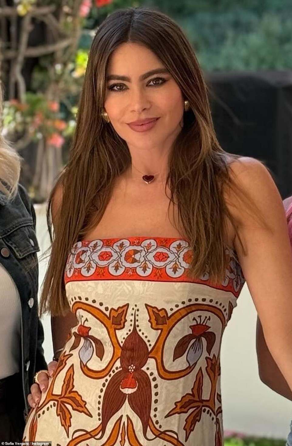The siren from Colombia looked her best in a colorful strapless dress that made her look ready for a poolside cocktail party in Monaco.  She added a heart necklace