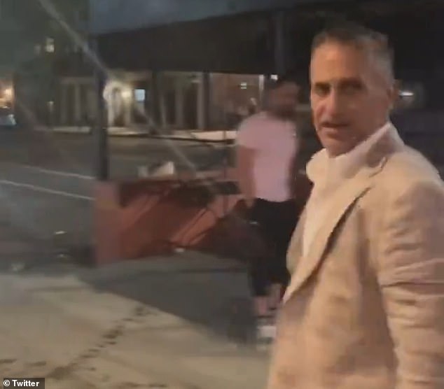 The banker, seen here turning in the aftermath of the attack, works as a Managing Director at Moelis & Company, a leading investment bank with offices in Midtown Manhattan