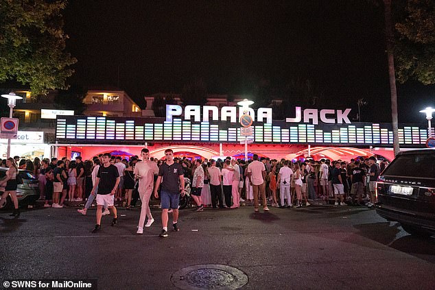 Clubbers crowd outside Magaluf's popular Panama Jack bar