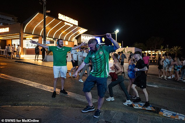 On Saturday evening the streets were packed with singing Northern Irish football fans as they commiserated over their 5-1 defeat to Spain in an international friendly.