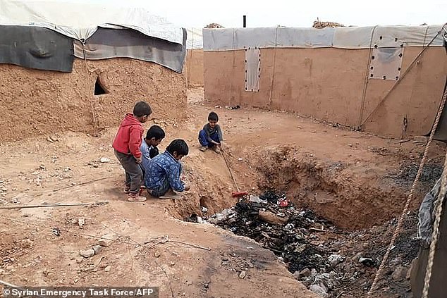 Last month's photo shows displaced Syrian children playing near a garbage dump in the Rukban camp, located in a no man's land in southern Syria, on the border with Iraq and Jordan.  The Rukban camp was established in 2014, at the height of Syria's ongoing war, as desperate people fled Islamic State (IS) jihadists and government bombardments in the hope of entering Jordan.