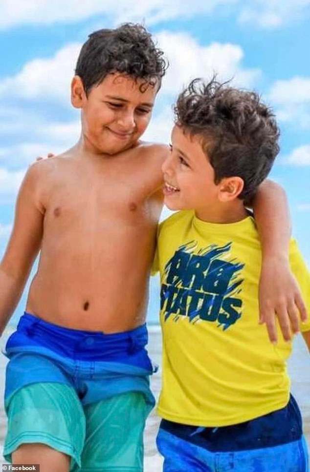 The Iskander boys, Mark and Jacob, 11 and 8, died at the scene of the accident after Grossman's Mercedes struck them at high speed