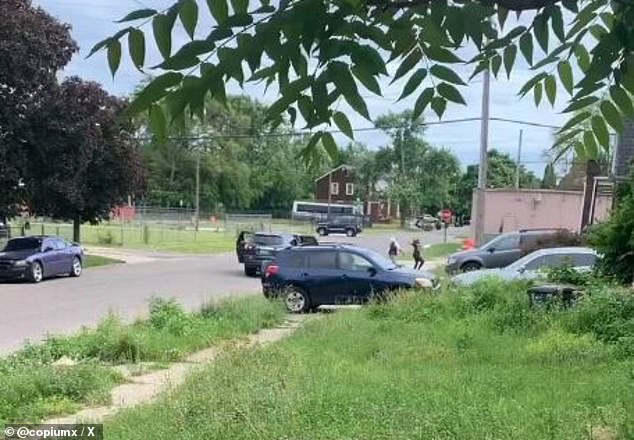 The girls are seen throwing things at the house just before they get into the car and crash into the other vehicle