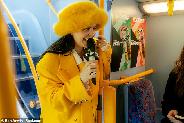 She cut a quirky figure in an oversized canary yellow suite and matching faux fur hat