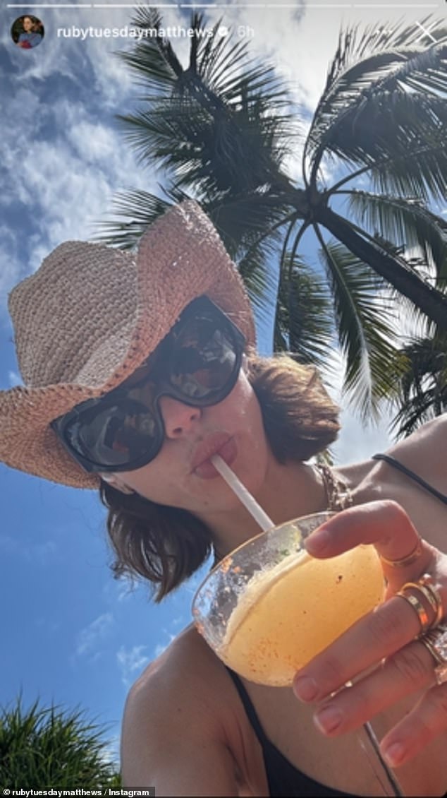 The next day, Ruby posted another update to her page, with a close-up photo of herself lounging by the hotel's pool.  'To all the influencers who make traveling with kids look easy - What the real f*ck.  Maybe it's my two spicy margaritas talking but that was complete BS,” she ranted in the caption