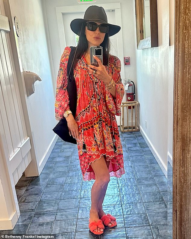 Bethenny donned an orange patterned dress and showed off her toned legs