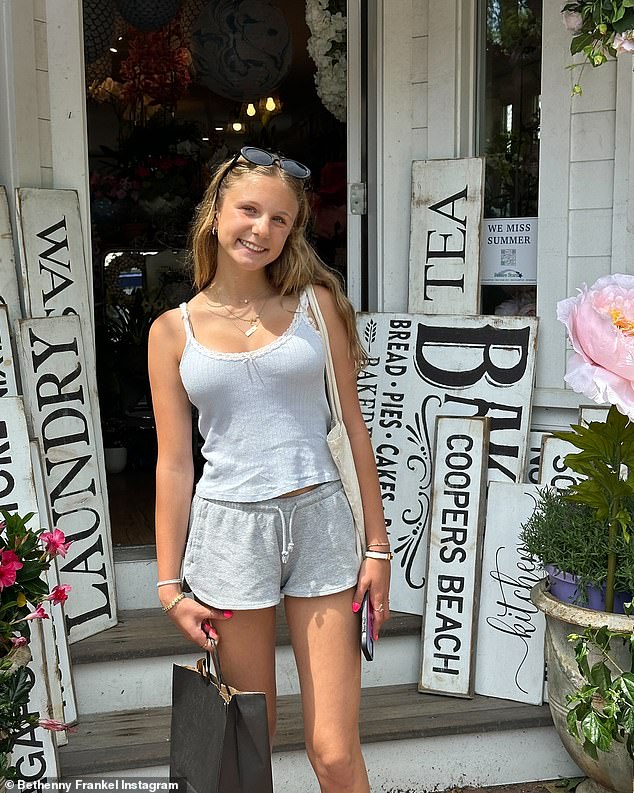 Brynn smiled as he showed off a bright pink manicure during a shopping trip