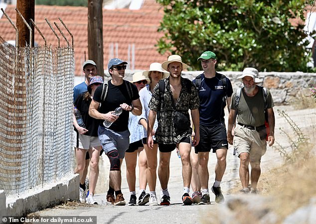 Young British volunteers and family friends walked the path towards Agua Marina near Pedi on Friday while looking for Dr.  Mosley