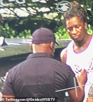 Young Thug is pictured during his arrest in Atlanta's upscale Buckhead neighborhood