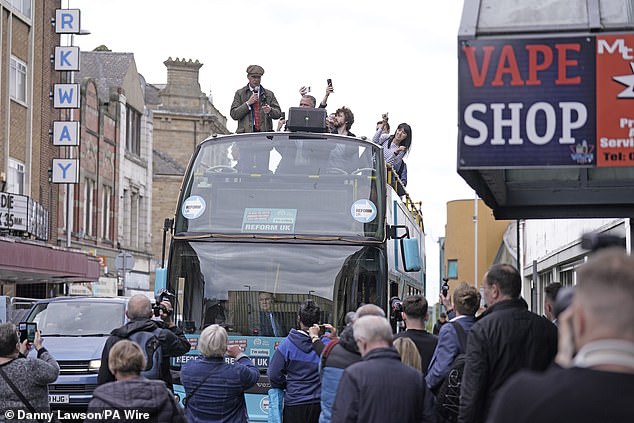 1718106336 265 Nigel Farage is pelted with wet cement and coffee cup