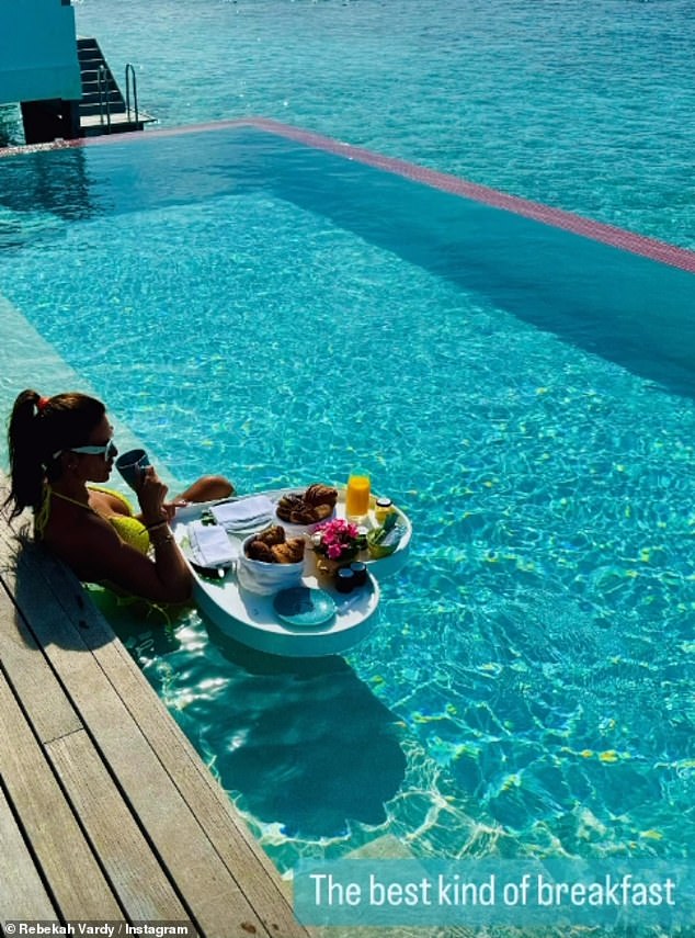 Taking to her Instagram Story, Rebekah showed off what a morning on their lavish trip looks like as she relaxed in an infinity pool, clad in a neon yellow bikini, with a floating tray of an array of pastries and juices.