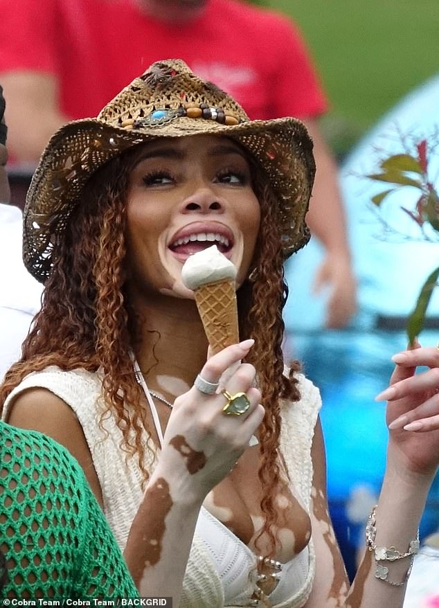 And his girlfriend Harlow treated herself to a vanilla ice cream as she braved the Italian heat