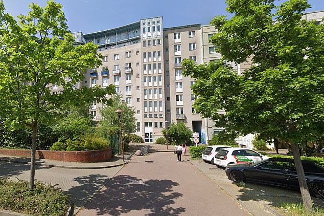 Police were alerted to the incident in an apartment building (photo) in the Altglienicke district of Berlin around 1 p.m. on Monday.