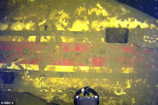 The crew discovered a broken fuselage, or main body of an aircraft, in the depths of the water with matching paint (pictured) for the plane that disappeared all those years ago