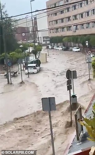 Water flooded the streets of Murcia on Monday as heavy rain hit Spain's southeastern region