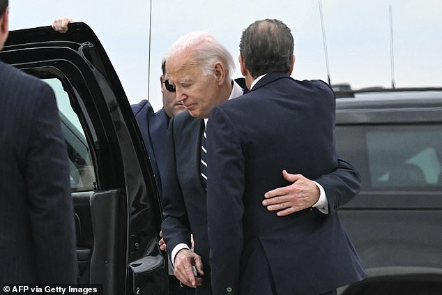 President Joe Biden holds his son Hunter Biden who was convicted on federal drug charges on Tuesday in Wilmington, Delaware