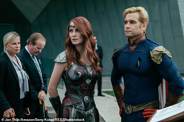 Antony Starr (R) stars as Homelander, the psychopathic leader of Vought's superhero team, The Seven