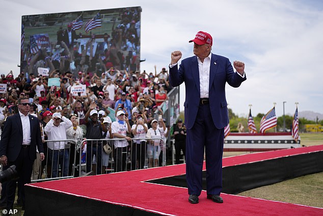 Republican presidential candidate, former President Donald Trump, moves as he walks onto the stage during a campaign rally, June 9, 2024, in Las Vegas