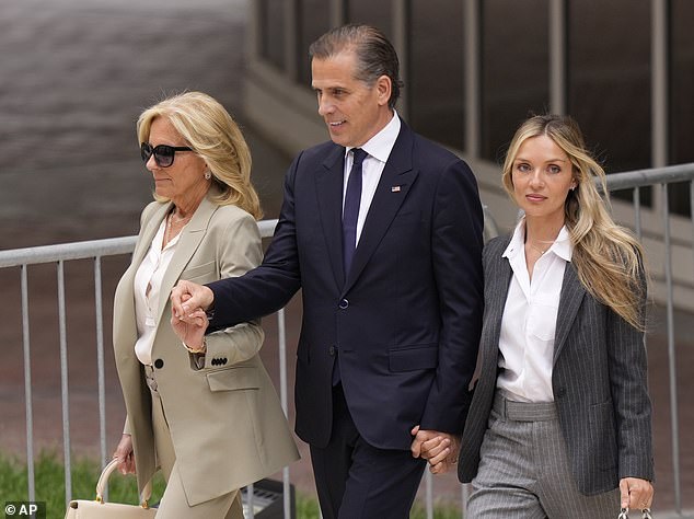 First lady Jill Biden (left) holds hands with her stepson Hunter Biden (center) and wife Melissa Cohen (right) as they leave the courthouse in Wilmington on Tuesday, after receiving the guilty verdict