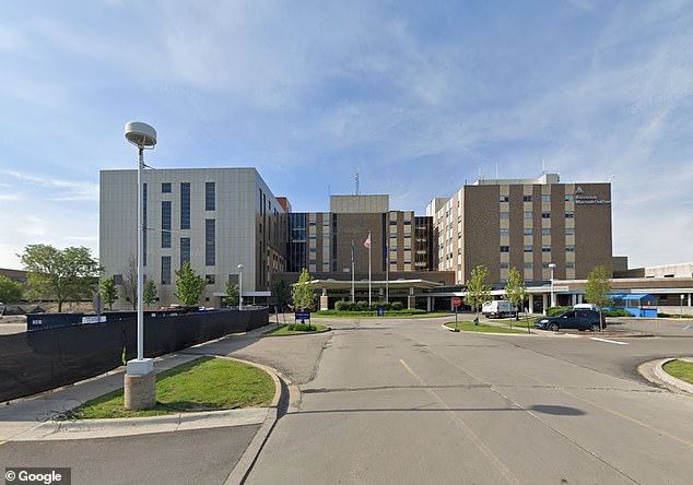 Morris, 53, is suing Ascension Macomb Oakland Hospital (pictured) in Warren, Michigan for racial discrimination, according to People.  He was taken to hospital with chest pain and shortness of breath