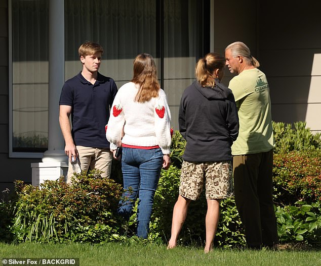 The famous conservationists were all smiles recently as they said goodbye to their family outside a home in Oregon