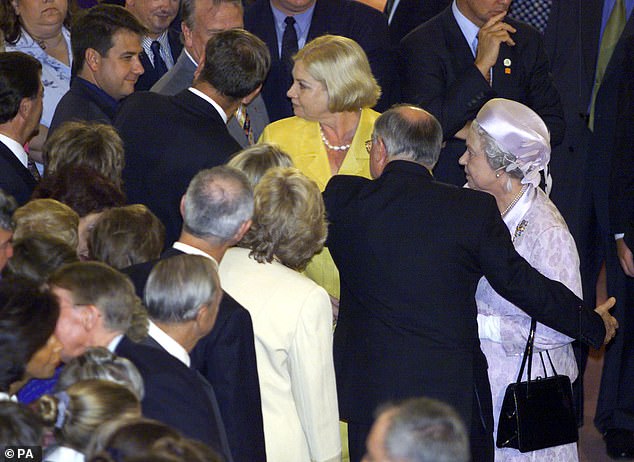 Former Prime Minister John Howard also broke protocol by shaking hands with Queen Elizabeth during an official reception at the Australian Parliament in 2000.